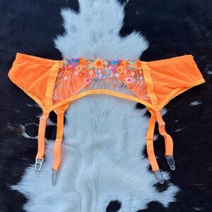 Neon Orange mesh lingerie garter belt with adjustable straps and flower details